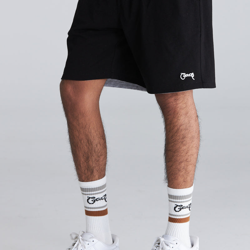 MEN’S REVERSIBLE SWEAT SHORTS