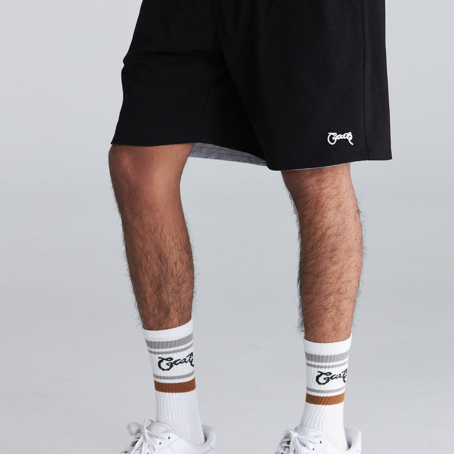 MEN’S REVERSIBLE SWEAT SHORTS